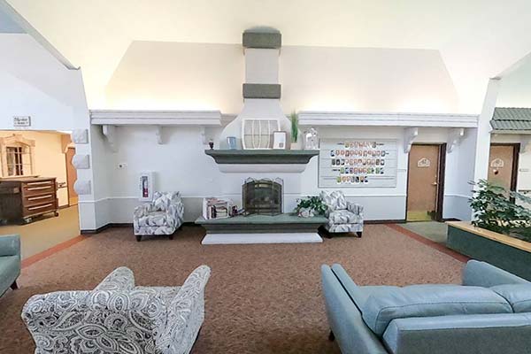 Apple Village indoor common area with fireplace