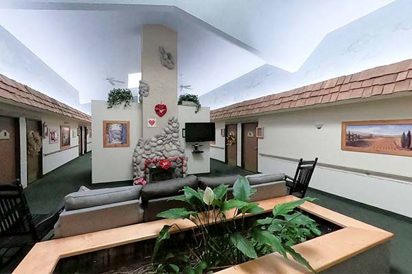 Apple Village Memory Care Lounge Area with fireplace